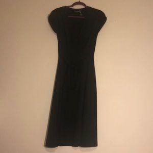 Black hourglass faux wrap dress